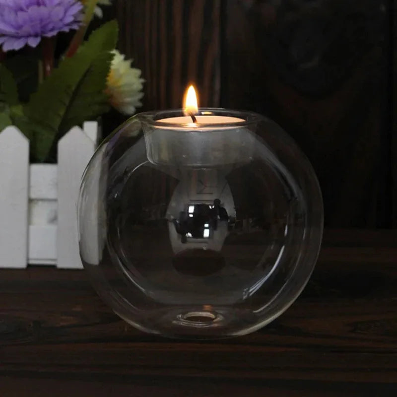 Bougeoir rond verre avec bougie chauffe-plat allumée
