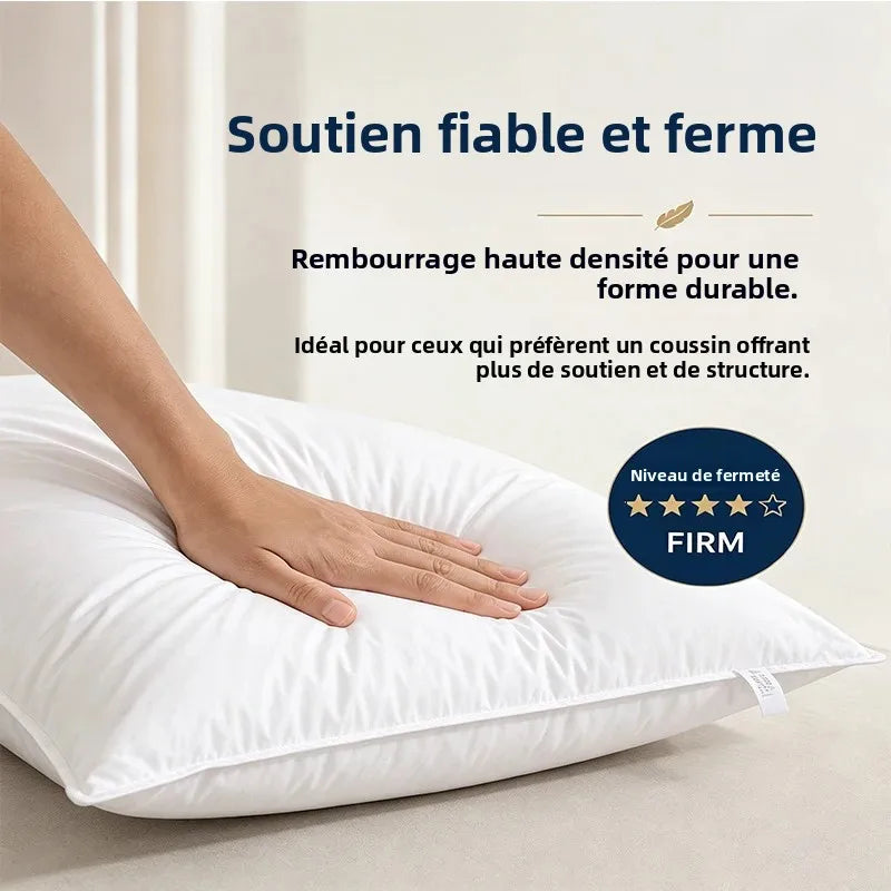 Oreiller duvet d'oie sur un lit naturel