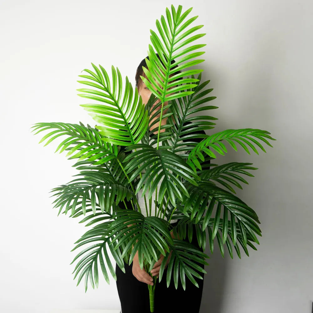 Palmier Monstera artificiel feuillage généreux, vue de profil