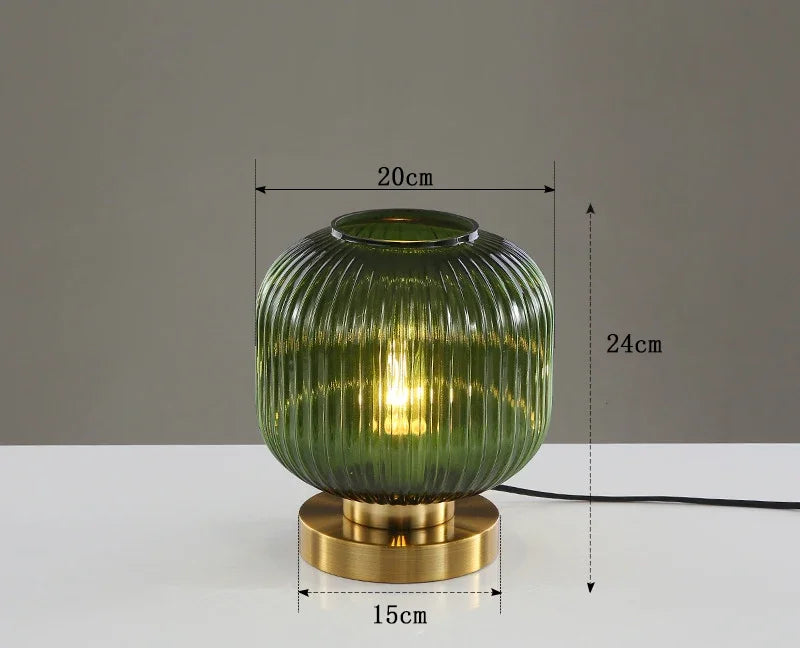 Lampe bureau verre soufflé, vue de face sur fond sombre